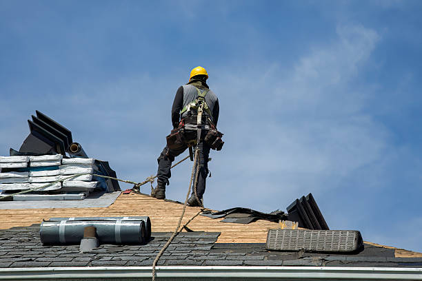 Professional Roof Replacement technician working in Wheeler, OR